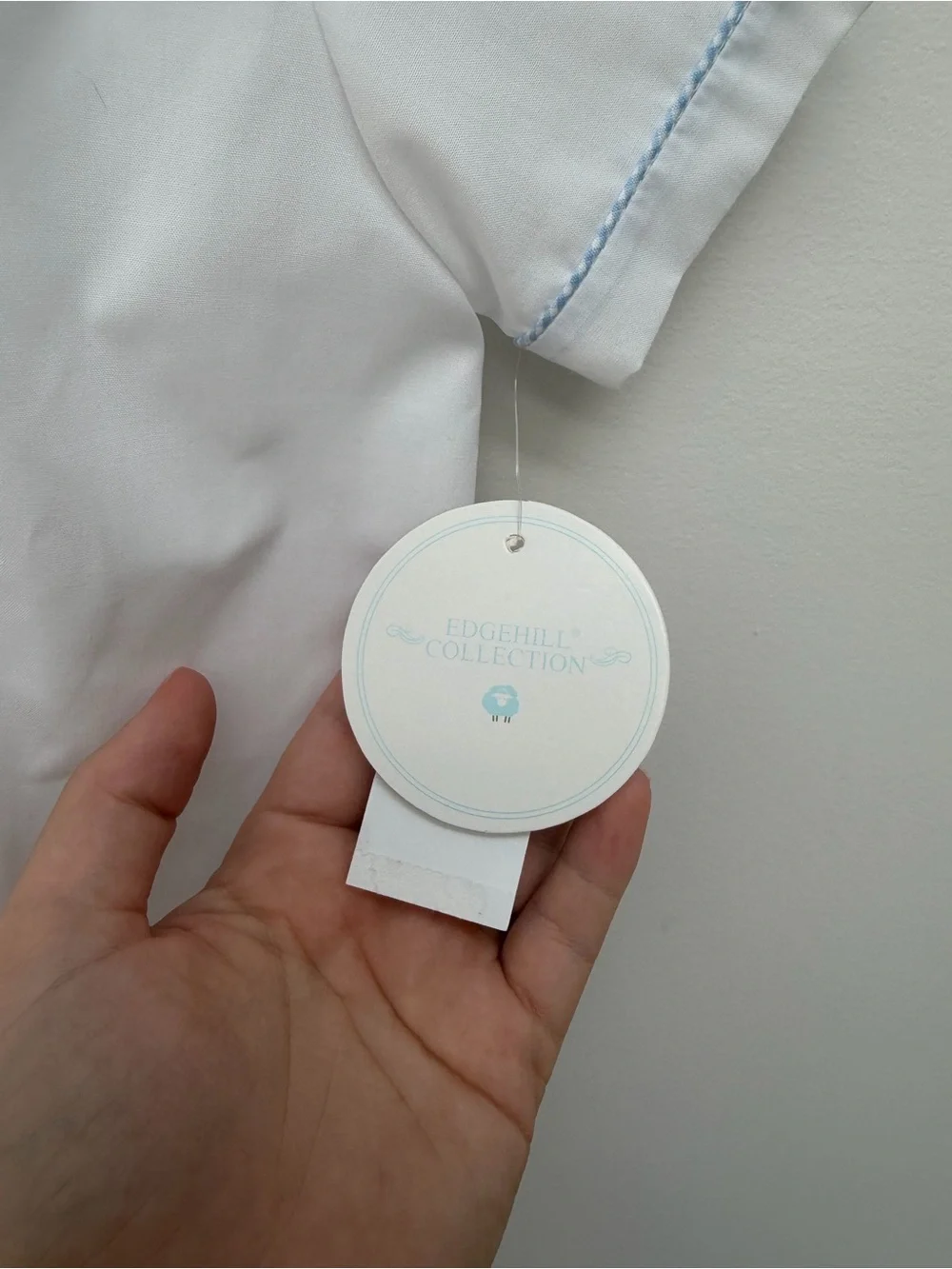 Edgehill Classic White Baby One-Piece with Blue Bunny Embroidery